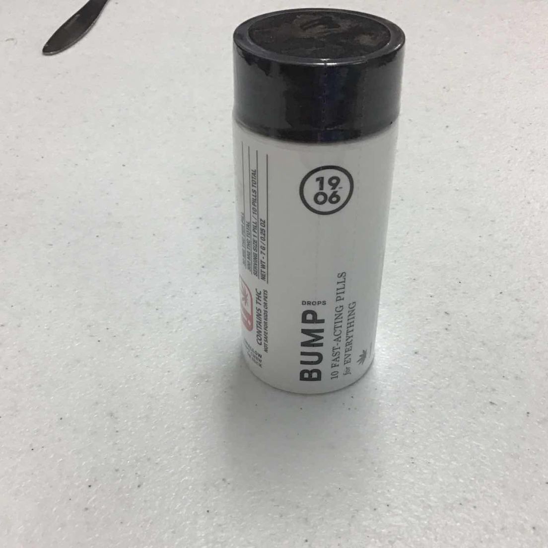 1906 Bump Drops Bottle