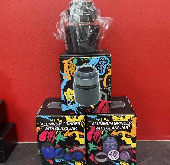 aluminum grinder with glass jar $32