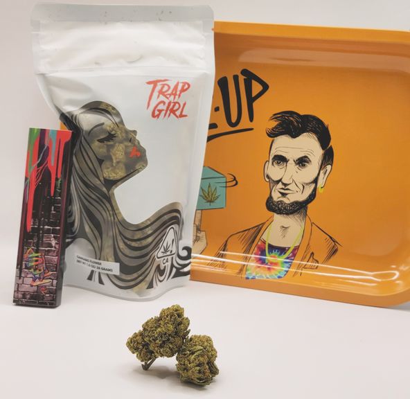 *Deal $105 1 oz. GMO Cookies (29.89%/Hybrid) - Trap Girl + Rolling Tray + Rolling Papers