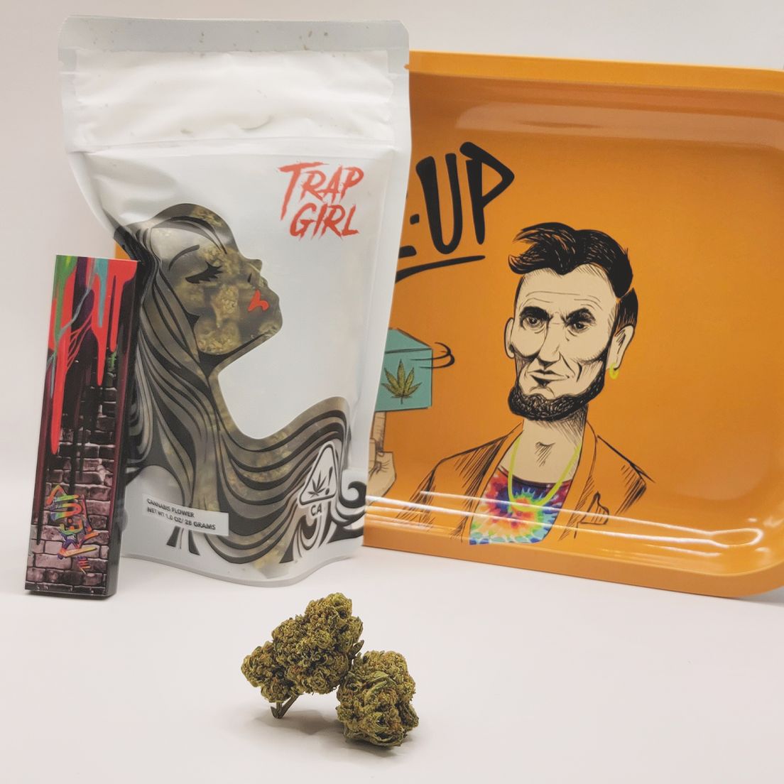 *Deal $105 1 oz. GMO Cookies (29.89%/Hybrid) - Trap Girl + Rolling Tray + Rolling Papers
